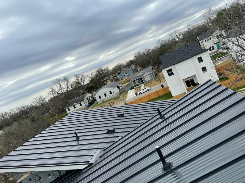 Standing seam metal roof panels with vents for Skylight Repair in Buda